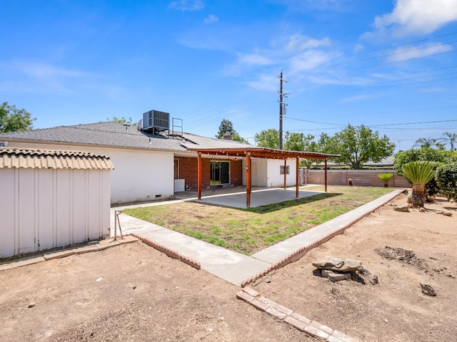 6413 N 5th St, Fresno, CA 93710 - back of house with a patio area and central AC