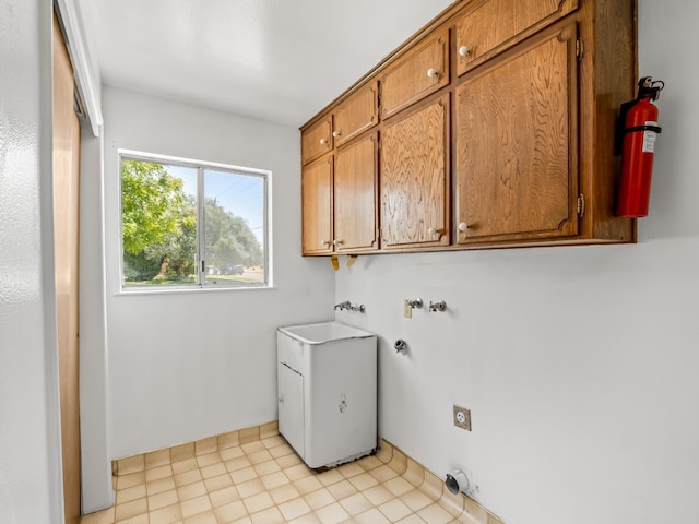 6413 N 5th St, Fresno, CA 93710 - laundry area featuring cabinet space and electric dryer hookup