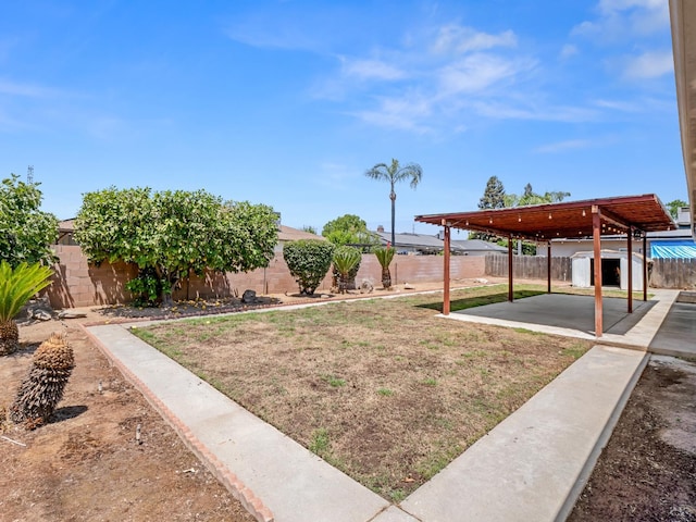 6413 N 5th St, Fresno, CA 93710 - view of yard with a patio