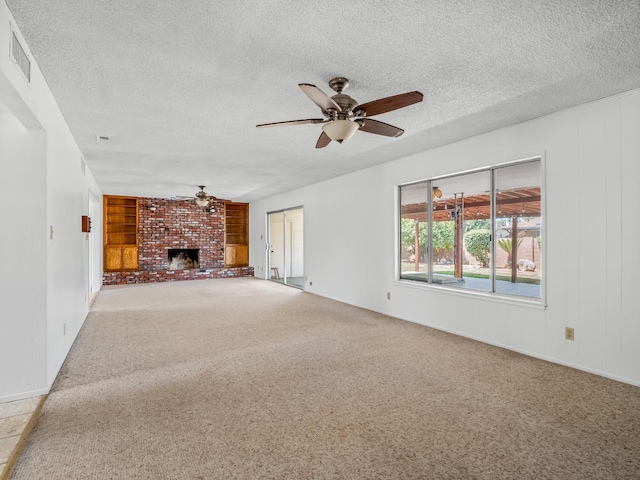 6413 N 5th St, Fresno, CA 93710 - unfurnished living room with a ceiling fan, carpet floors, and a textured ceiling