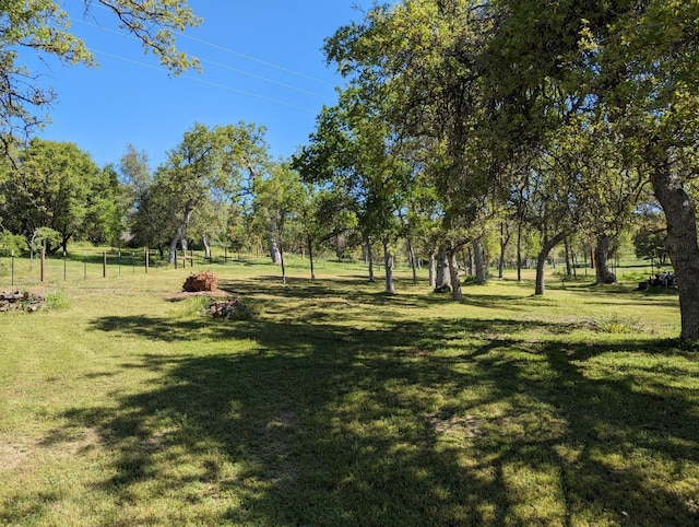 51410 Wildmint Ln, Yokuts Valley, CA 93675 - view of community with a lawn