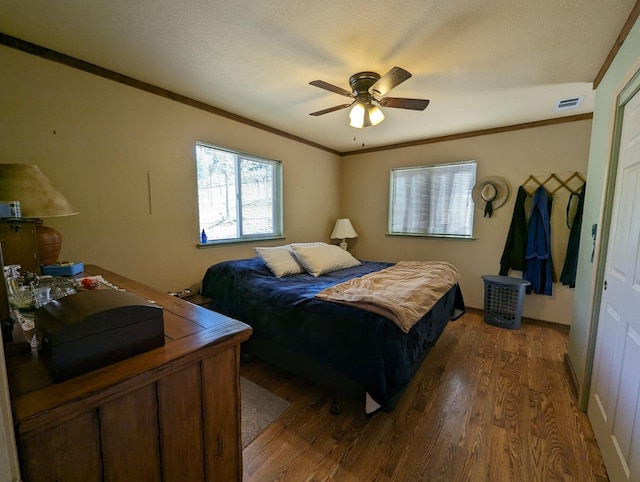 51410 Wildmint Ln, Yokuts Valley, CA 93675 - bedroom featuring dark wood-style flooring, ornamental molding, and a ceiling fan