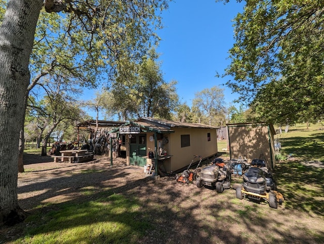 51410 Wildmint Ln, Yokuts Valley, CA 93675 - back of property featuring an outdoor structure