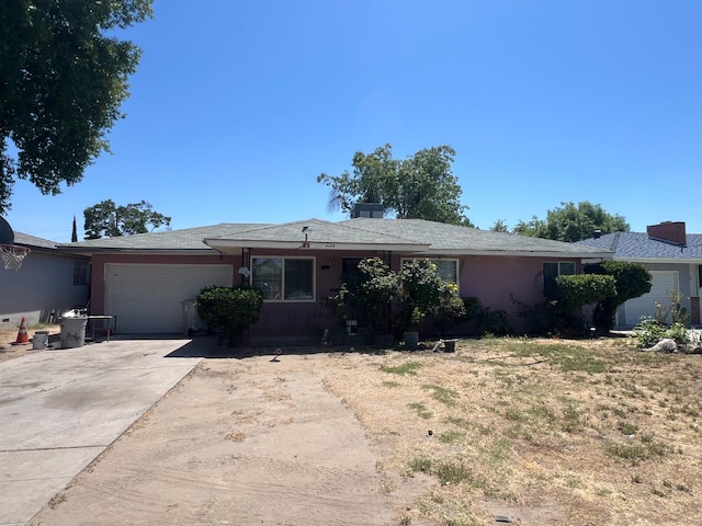 4664 E Browne St, Fresno, CA 93703 - single story home with an attached garage and driveway