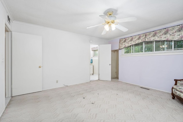 5835 E Hamilton Ave, Fresno, CA 93727 - empty room with carpet floors, crown molding, and ceiling fan