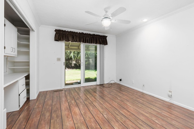 5835 E Hamilton Ave, Fresno, CA 93727 - unfurnished room with crown molding, hardwood / wood-style floors, a ceiling fan, and baseboards