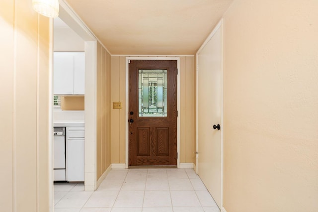 5835 E Hamilton Ave, Fresno, CA 93727 - entrance foyer with light tile patterned flooring and baseboards