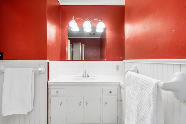 5835 E Hamilton Ave, Fresno, CA 93727 - bathroom with a wainscoted wall and vanity