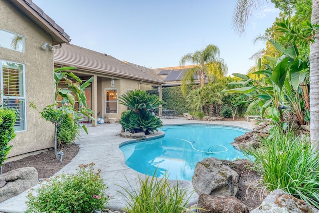 1223 E Rosemont Ln, Fresno, CA 93730 - outdoor pool with a patio