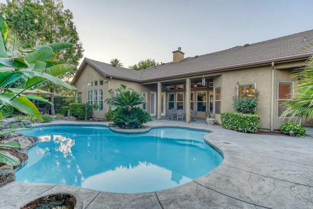 1223 E Rosemont Ln, Fresno, CA 93730 - outdoor pool featuring a patio area and ceiling fan