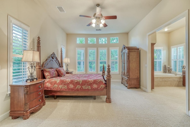 1223 E Rosemont Ln, Fresno, CA 93730 - bedroom featuring multiple windows, carpet flooring, and baseboards