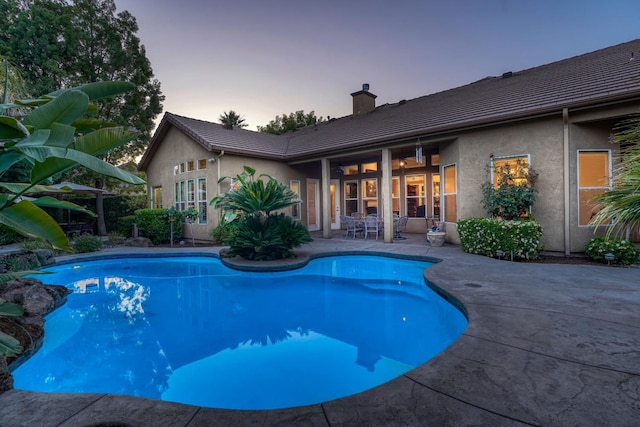 1223 E Rosemont Ln, Fresno, CA 93730 - outdoor pool with a patio area