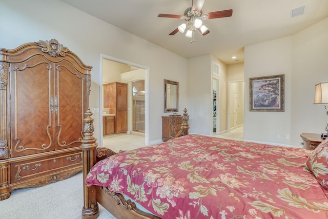 1223 E Rosemont Ln, Fresno, CA 93730 - bedroom with light carpet, ensuite bathroom, baseboards, and ceiling fan