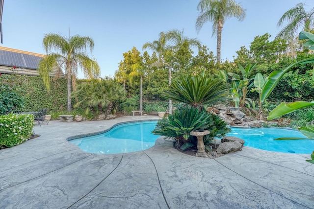 1223 E Rosemont Ln, Fresno, CA 93730 - swimming pool featuring a patio