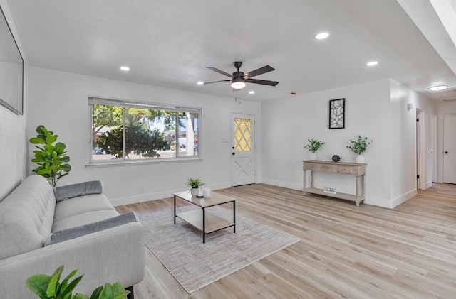 3678 N 7th St, Fresno, CA 93726 - living area with light wood finished floors, a ceiling fan, recessed lighting, and baseboards