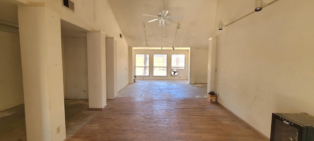5092 W Stuart Ave, Fresno, CA 93722 - hallway with a towering ceiling and wood finished floors