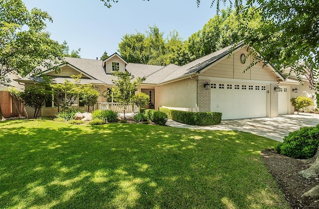 736 N Dartmouth Ave, Clovis, CA 93611 - view of front facade featuring an attached garage, brick siding, and concrete driveway