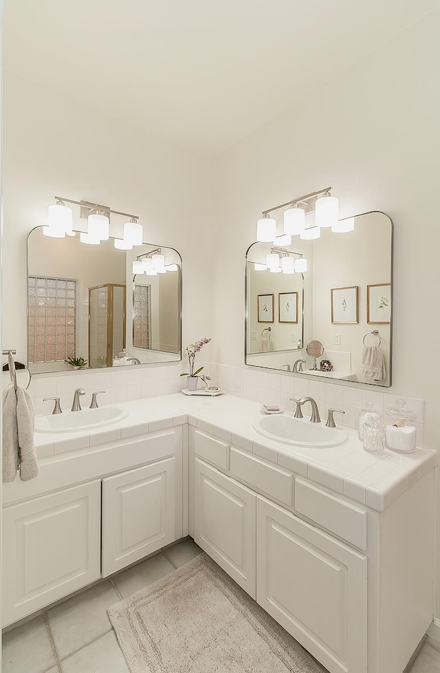 736 N Dartmouth Ave, Clovis, CA 93611 - bathroom featuring double vanity and tile patterned flooring