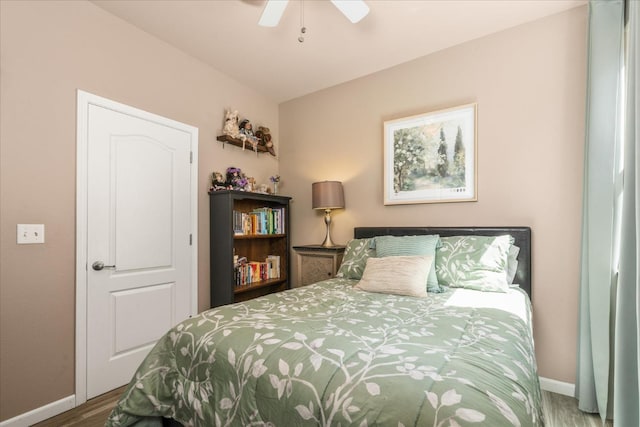 3675 Trenton Ln, Clovis, CA 93619 - bedroom with baseboards, wood finished floors, and ceiling fan