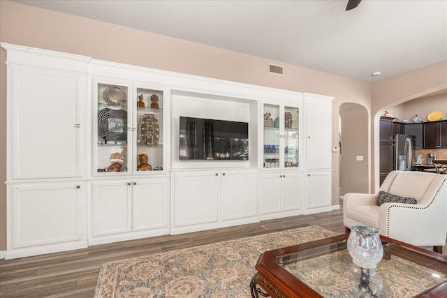 3675 Trenton Ln, Clovis, CA 93619 - living area featuring wood finished floors and arched walkways