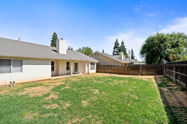 6051 N Tracy Ave, Fresno, CA 93722 - view of yard featuring a patio area