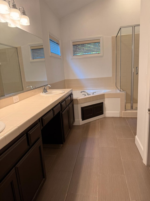 9850 N Winery Ave, Fresno, CA 93720 - bathroom featuring a garden tub, double vanity, and a shower stall