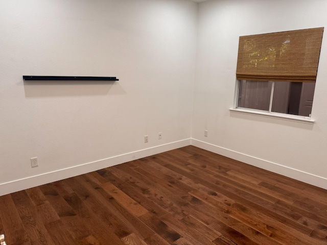 9850 N Winery Ave, Fresno, CA 93720 - empty room with baseboards and dark wood-style floors