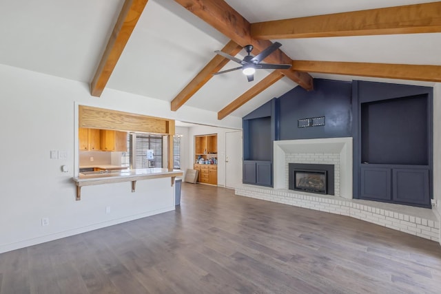 300 W Adrian Way, Hanford, CA 93230 - unfurnished living room with a ceiling fan, dark wood-type flooring, and a fireplace