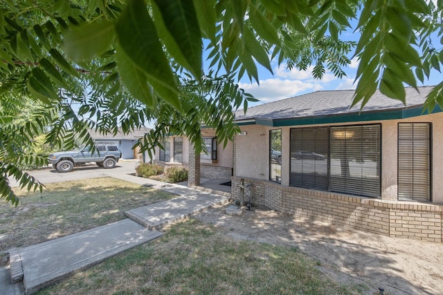 300 W Adrian Way, Hanford, CA 93230 - view of home's exterior with stucco siding