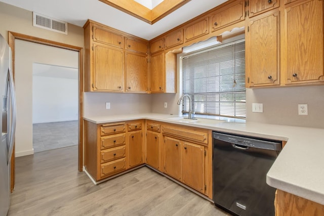 300 W Adrian Way, Hanford, CA 93230 - kitchen featuring dishwasher, light countertops, light wood finished floors, stainless steel fridge with ice dispenser, and a sink