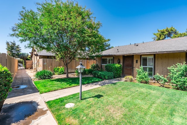 4849 N 7th St Unit E, Fresno, CA 93726 - ranch-style house featuring board and batten siding and a shingled roof