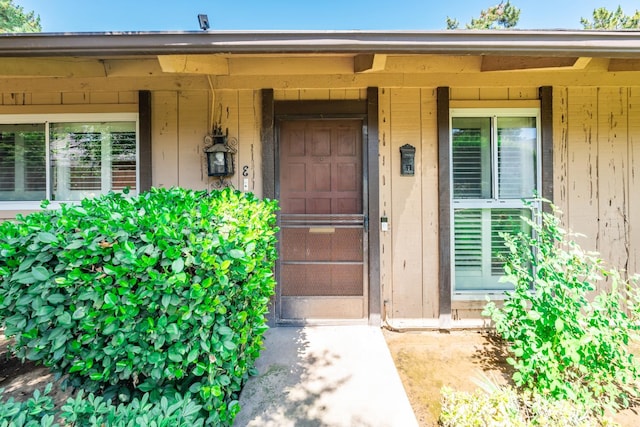 4849 N 7th St Unit E, Fresno, CA 93726 - doorway to property featuring covered porch