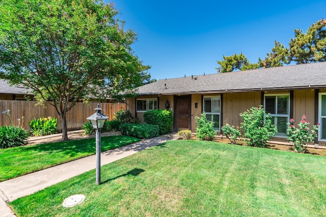 4849 N 7th St Unit E, Fresno, CA 93726 - ranch-style house with roof with shingles