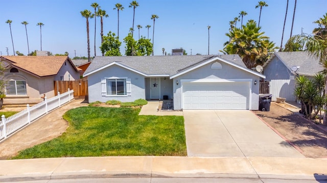 1226 Summer Field Dr, Hanford, CA 93230 - ranch-style house featuring stucco siding, a garage, and concrete driveway