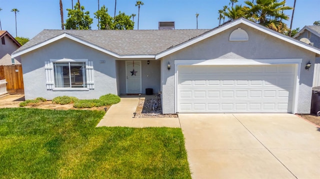 1226 Summer Field Dr, Hanford, CA 93230 - ranch-style house with stucco siding, an attached garage, driveway, and roof with shingles