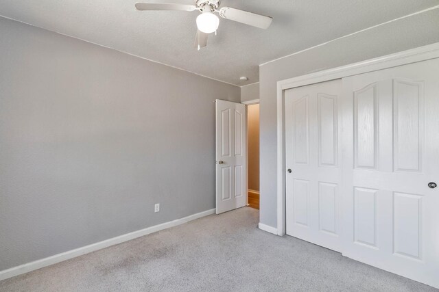 1226 Summer Field Dr, Hanford, CA 93230 - unfurnished bedroom with carpet, baseboards, a closet, and ceiling fan
