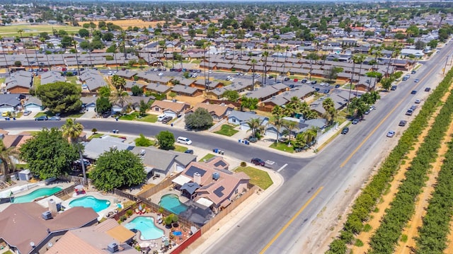 1226 Summer Field Dr, Hanford, CA 93230 - view of property location with a pool area and nearby suburban area