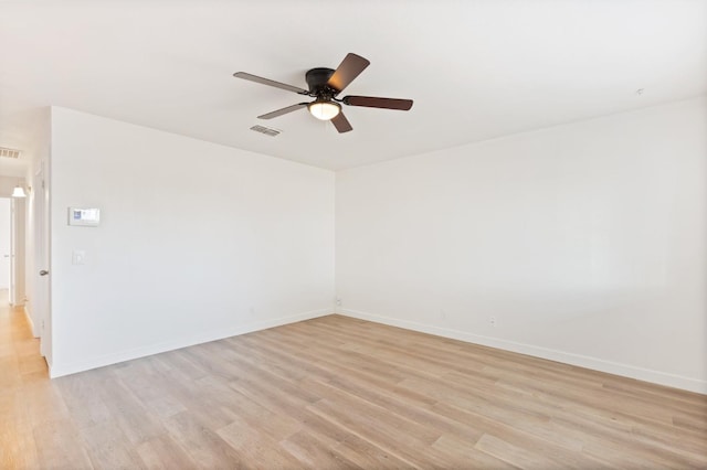 4003 E El Monte Way, Fresno, CA 93702 - spare room featuring light wood finished floors, ceiling fan, and baseboards