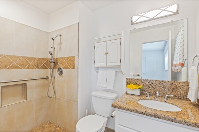 4003 E El Monte Way, Fresno, CA 93702 - bathroom with vanity, toilet, and a tile shower