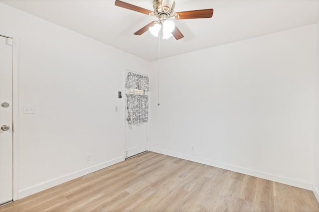4003 E El Monte Way, Fresno, CA 93702 - unfurnished room featuring light wood-style flooring, a ceiling fan, and baseboards