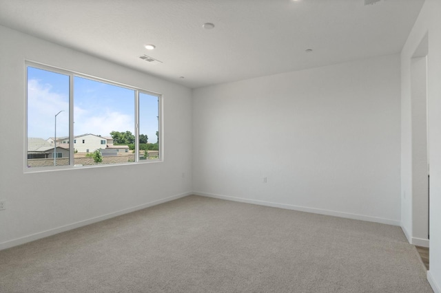 3210 Frontera Ave, Clovis, CA 93619 - unfurnished room featuring light colored carpet and baseboards