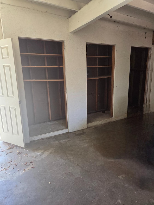 4531 E Fedora Ave, Fresno, CA 93726 - unfurnished bedroom with concrete flooring and beam ceiling