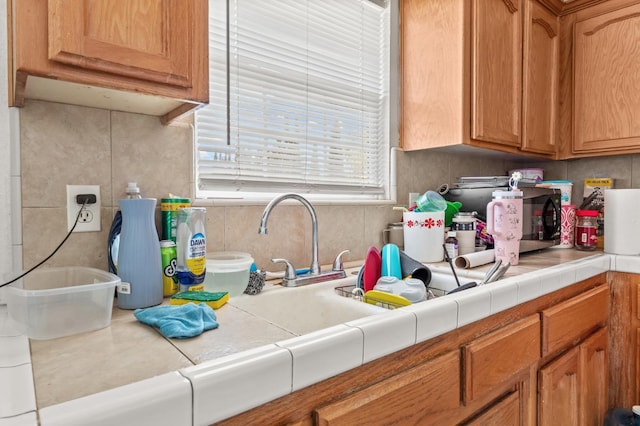 1808 Jenning St, Mendota, CA 93640 - kitchen featuring light countertops and brown cabinets
