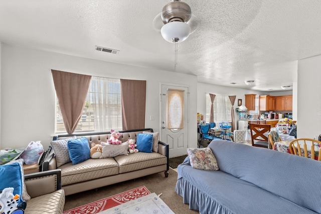 1808 Jenning St, Mendota, CA 93640 - carpeted living room featuring a textured ceiling