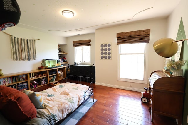 2210 W Spruce Ave, Fresno, CA 93711 - bedroom with wood-type flooring and baseboards
