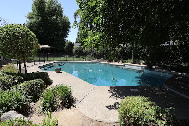 2210 W Spruce Ave, Fresno, CA 93711 - view of swimming pool featuring a patio
