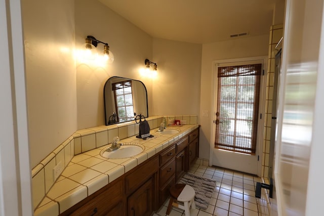 2210 W Spruce Ave, Fresno, CA 93711 - bathroom featuring double vanity and tile patterned floors