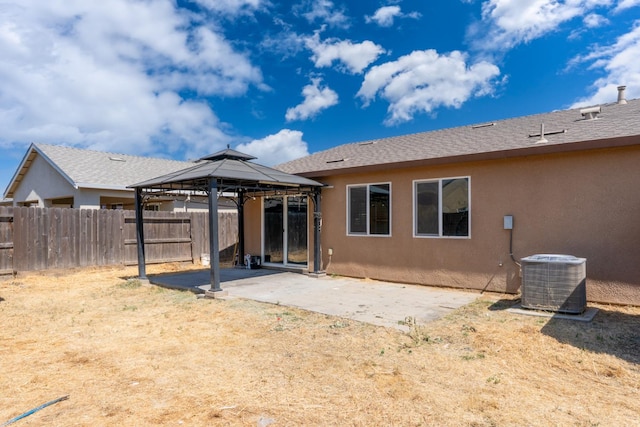5576 E Burns Ave, Fresno, CA 93727 - rear view of property with central AC unit, a gazebo, a patio, and stucco siding