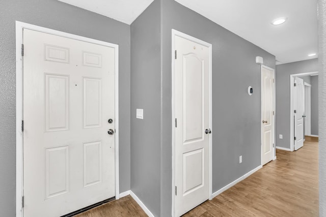 5576 E Burns Ave, Fresno, CA 93727 - entryway with light wood-type flooring and baseboards