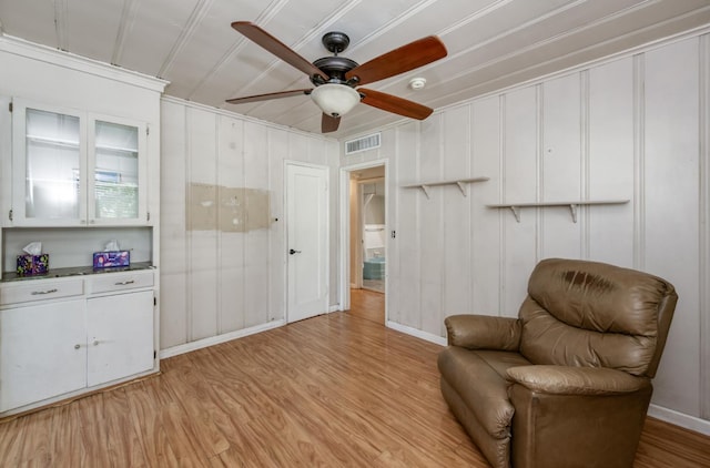 724 W Harvard Ave, Fresno, CA 93705 - sitting room with a ceiling fan, light wood-style flooring, and baseboards